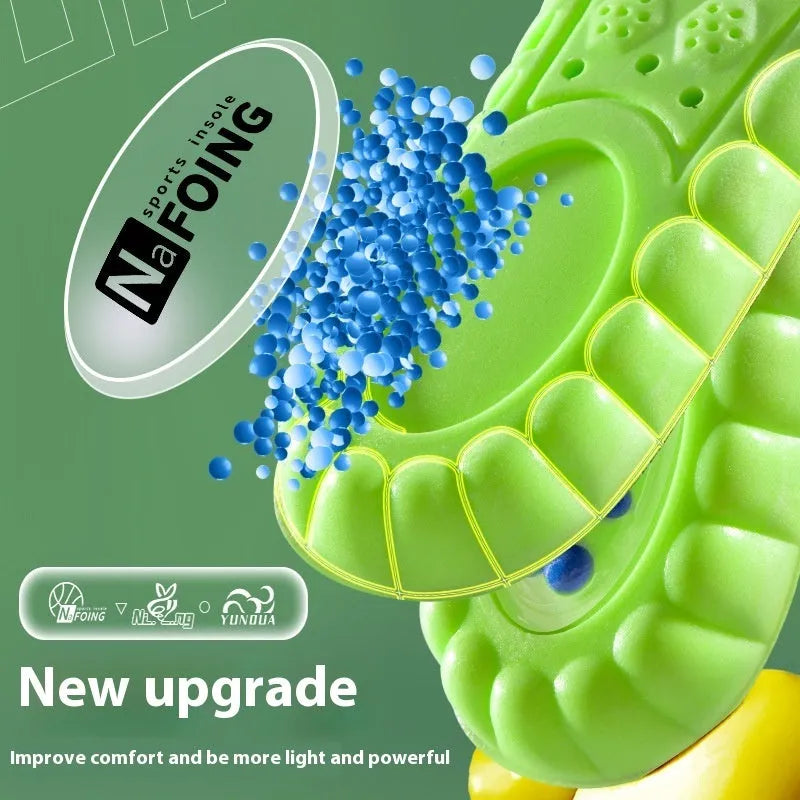 Green PU air cushion sports insoles with argy wormwood for sweat absorption, shown on a white background.