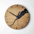 Modern wooden wall clock with a creative crack pattern design on its face, shown in one of five available colour options.