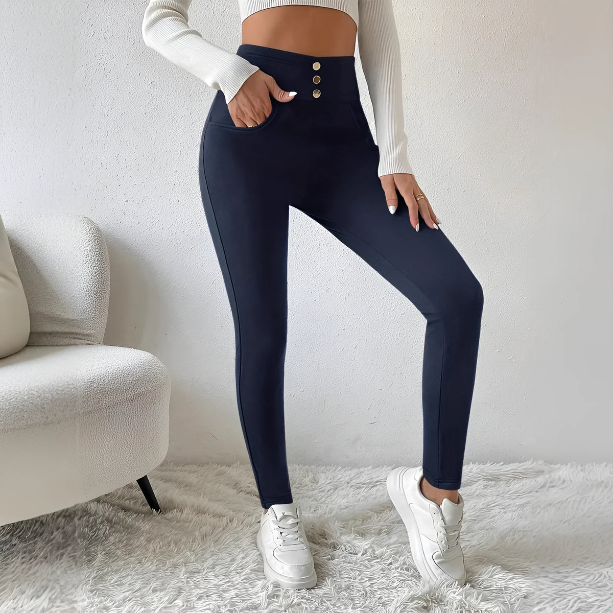 Navy blue women's high waist slim trousers with straight leg cut on hanger