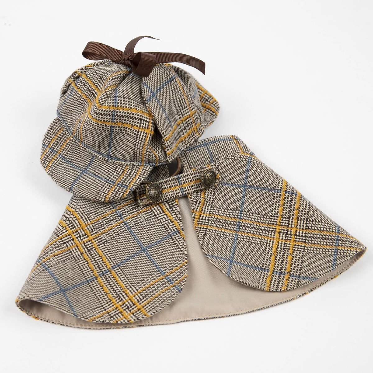 Camel coloured cotton pet cloak with adjustable hood shown on dog model