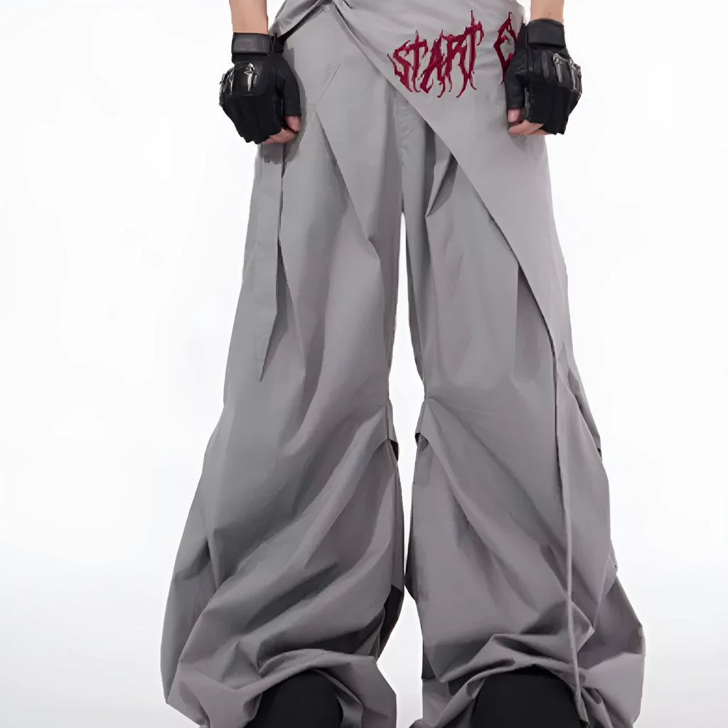 Boy wearing black wide-leg trousers in a refined Korean style, showcasing a casual and trendy look.