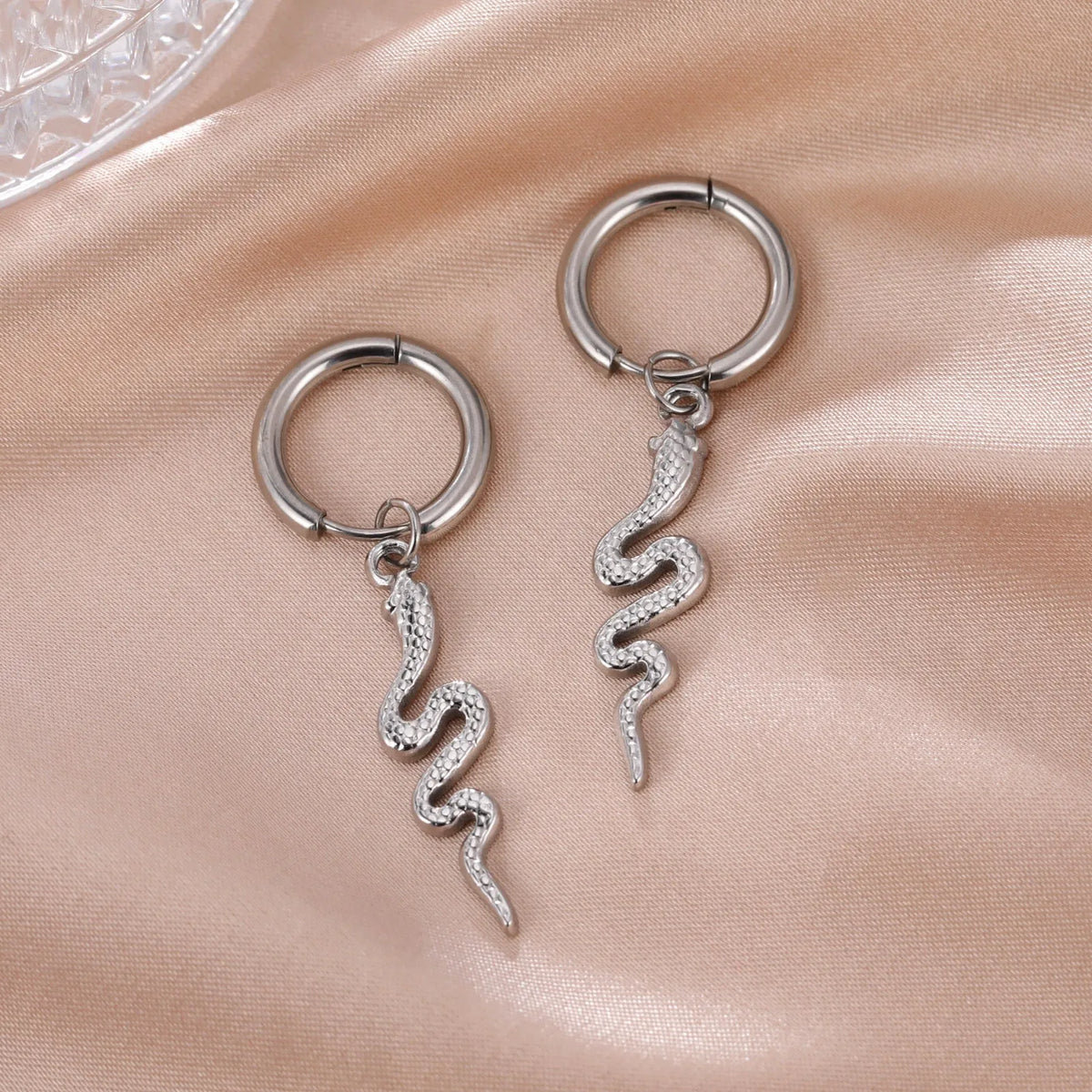 Gold plated snake-shaped stainless steel clip earrings with vintage animal design