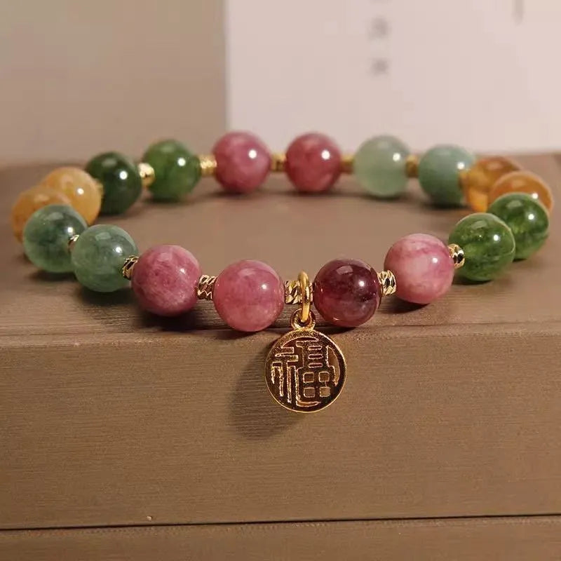 Tourmaline bracelet with natural stones in floral design and electroplated geometric setting