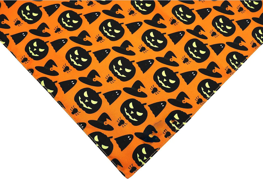 Halloween dog bandana with pumpkin and spider web patterns on reversible black and orange triangle bib