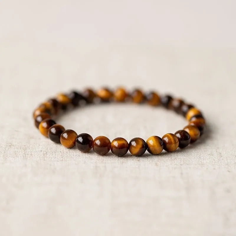 Tigereye stone Buddha bracelet with single circle rosary design showing natural banded patterns on beads