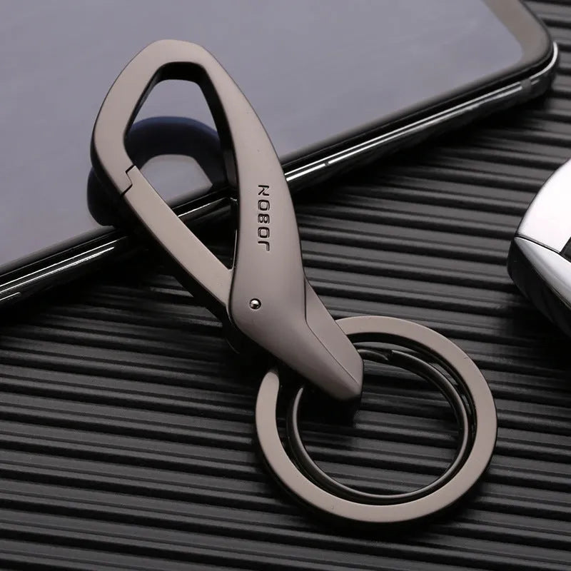 Zinc alloy double ring keychain in black, chrome, or nickel finish, measuring 8.3 by 3.5 cm.
