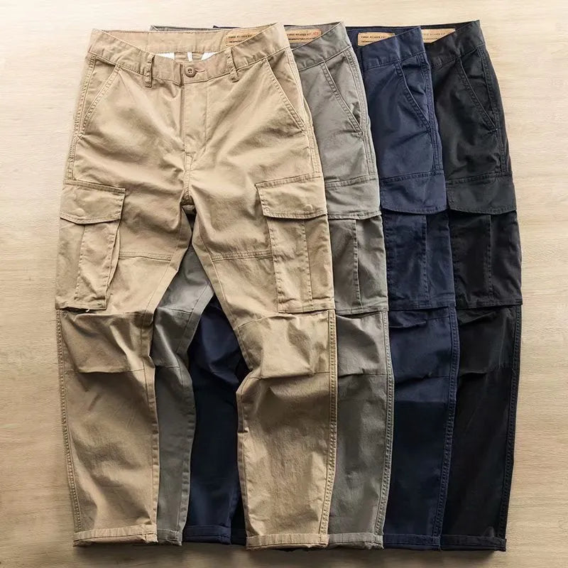 Men's multi-pocket cotton labour protection trousers in khaki, showing cropped leg length and solid colour design.