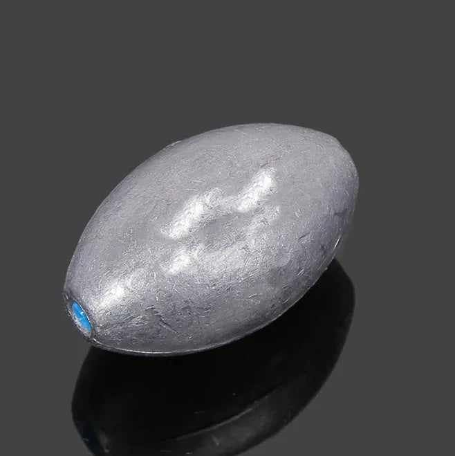 Rugby-shaped olive green lead fishing sinker with plastic core, shown with weight options from 10g to 150g.
