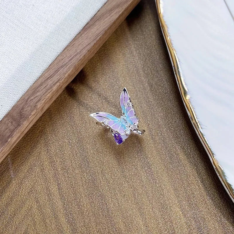 Adjustable opening copper ring featuring an insect motif with a dripping oil texture finish.