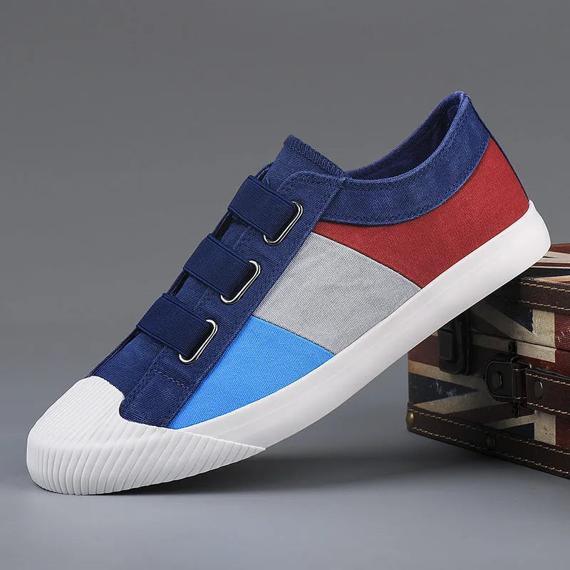 Men's low-top canvas sneakers with elastic band closure and round toe in beige colour.