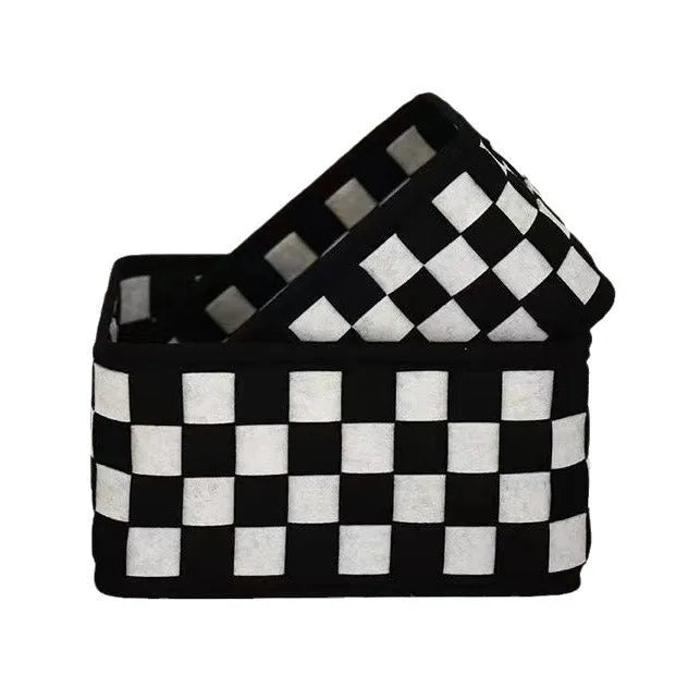 Checkerboard patterned grey felt folding storage basket shown upright and collapsed flat.