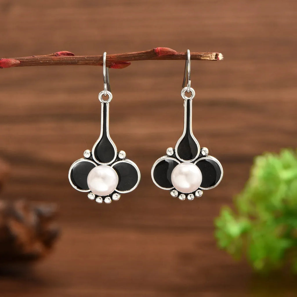 Silver electroplated alloy women's earrings with retro creative design for professional fashion styling