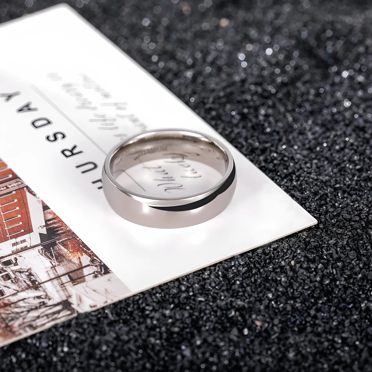 Polished silver titanium steel unisex ring showing 2mm 4mm 6mm width options with US sizing