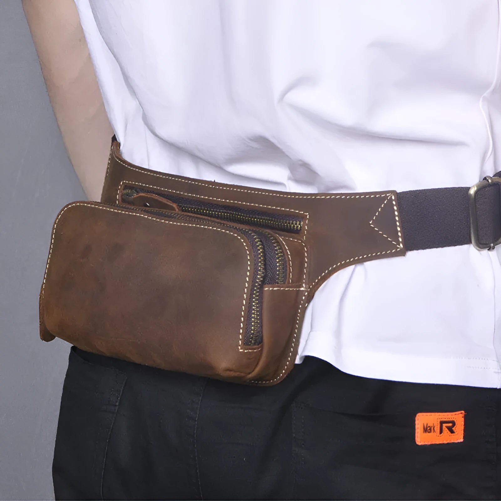 Brown leather men's sports waist bag with pull closure and phone compartment