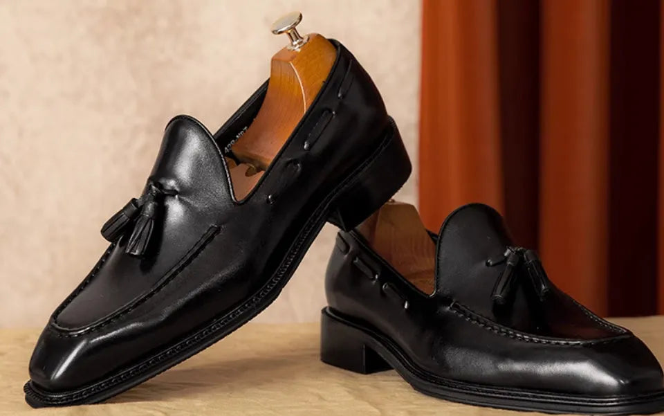 Men's black and brown genuine leather slip-on loafers with rubber soles and British style design