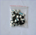 Black PA66 plastic automotive cable retaining clips for wiring management measuring 9mm by 12mm by 6.2mm