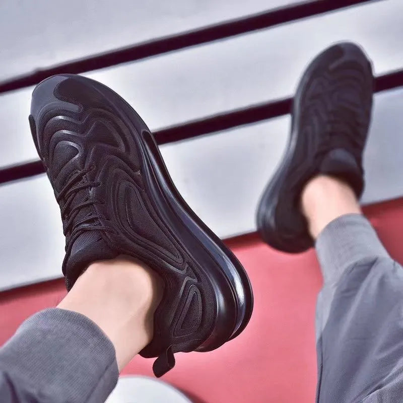 Men's black casual lace-up sneakers with thick sole and round toe design
