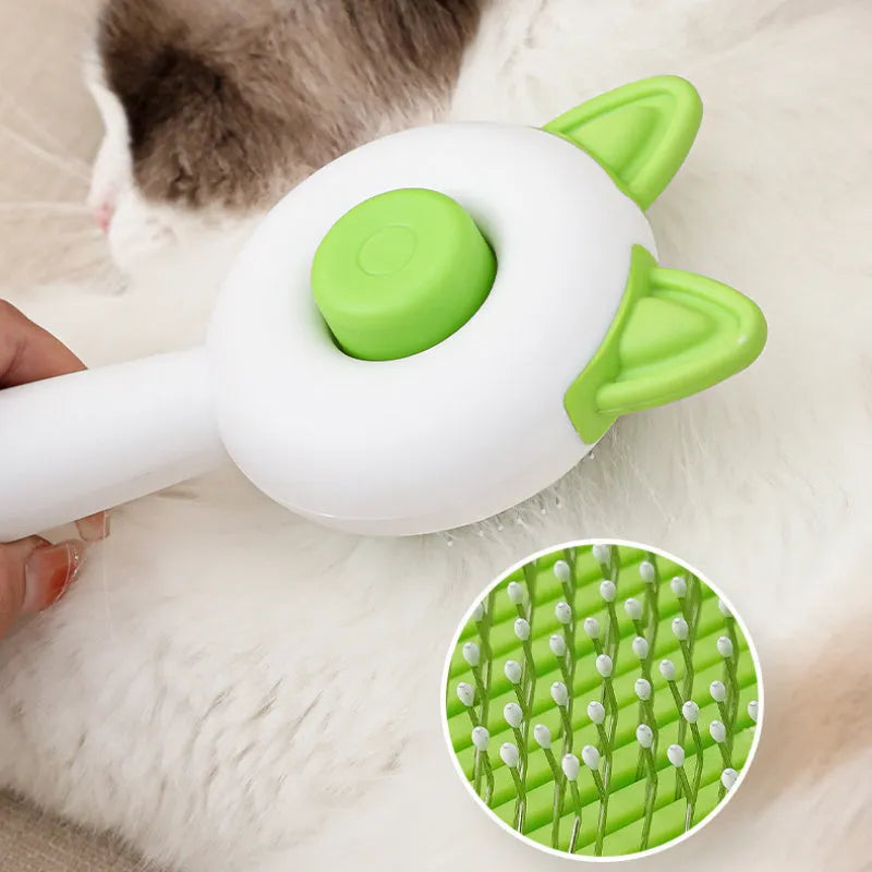 Self-cleaning cat grooming comb with stainless steel pins and rubber massage nodules in greenish white colour