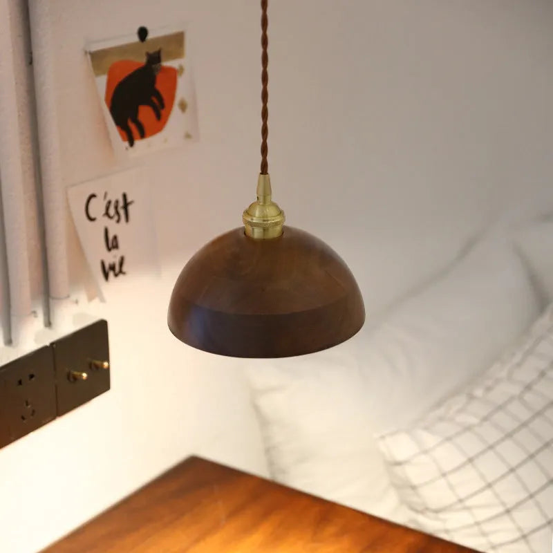 Black walnut wood single-head droplight chandelier with copper decorative accents.