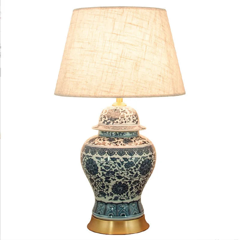 Chinese blue and white porcelain table lamp with ceramic base and cloth shade