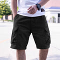 Man wearing loose fit Army Green cotton blend workwear shorts with micro-elastic stretch.