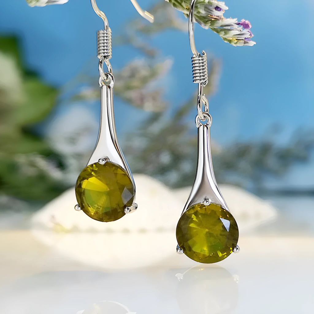 Olive green topaz water drop shaped earrings with retro design and minimalist styling