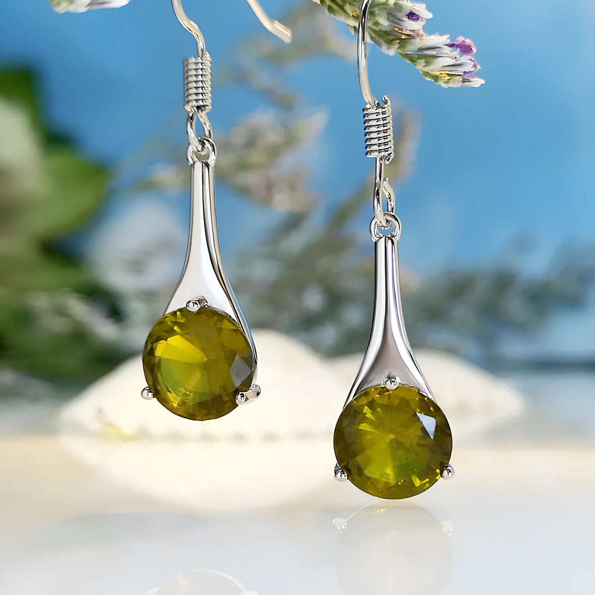 Olive green topaz water drop shaped earrings with retro design and minimalist styling