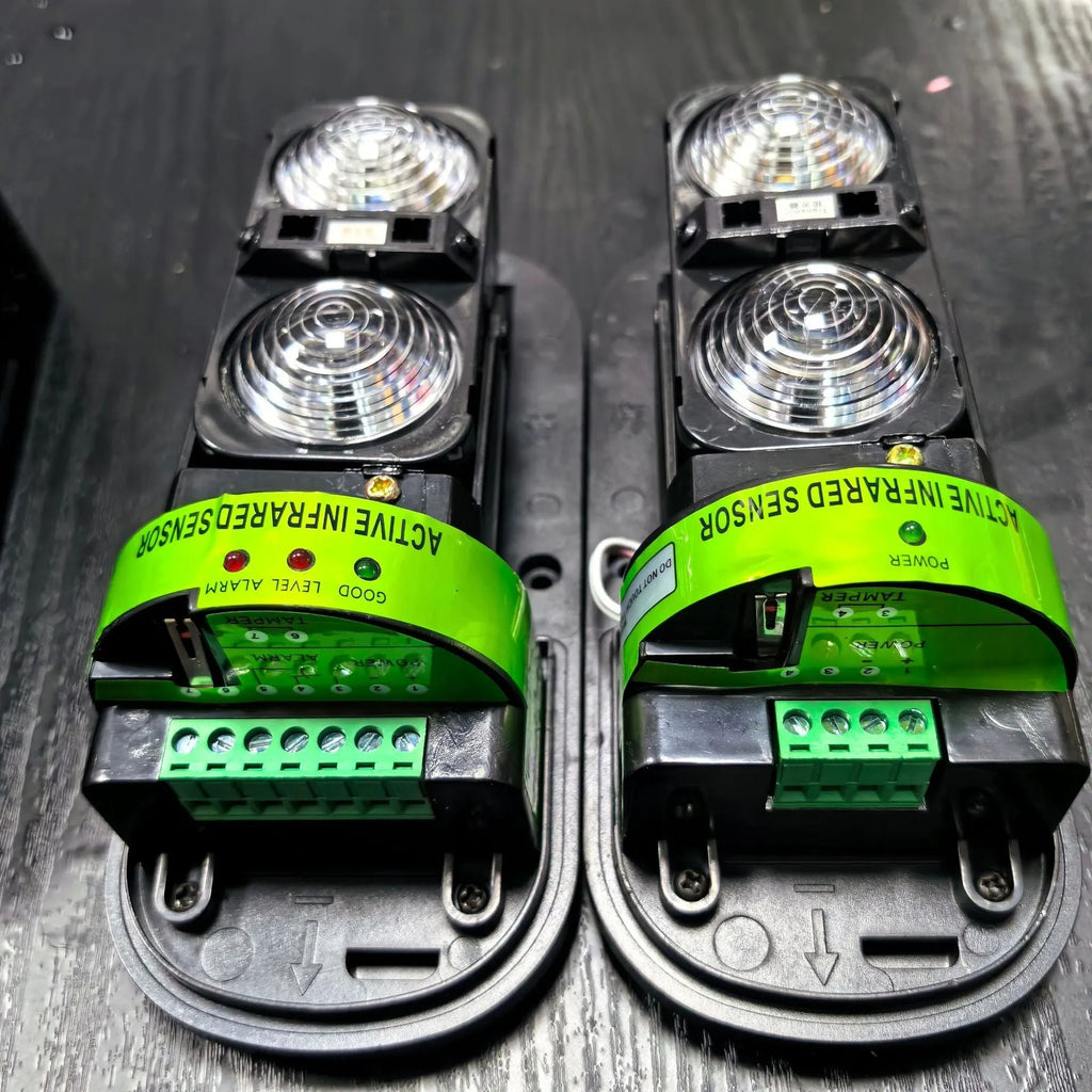 Black 2-beam infrared anti-theft alarm detector for warehouse and perimeter security with 150m range