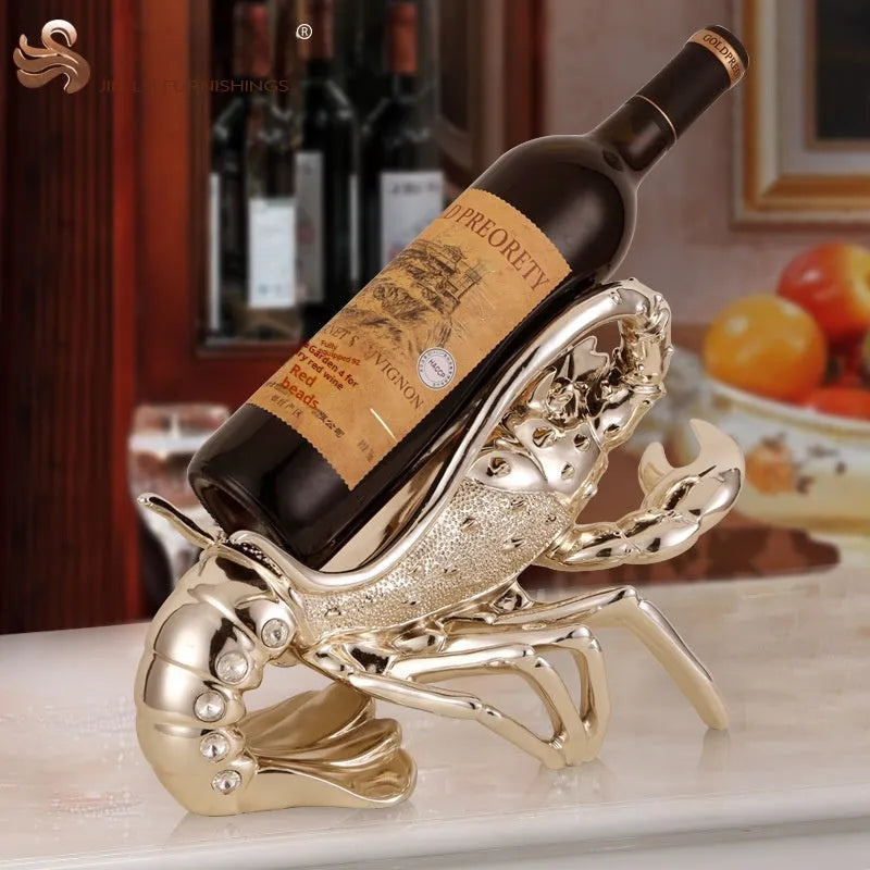 Lobster wine rack ornament in rose gold or silver metallic finish holding bottle