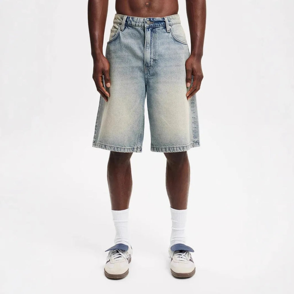 Men's loose straight cotton denim fifth pants in light blue, black, and gray for summer street style.