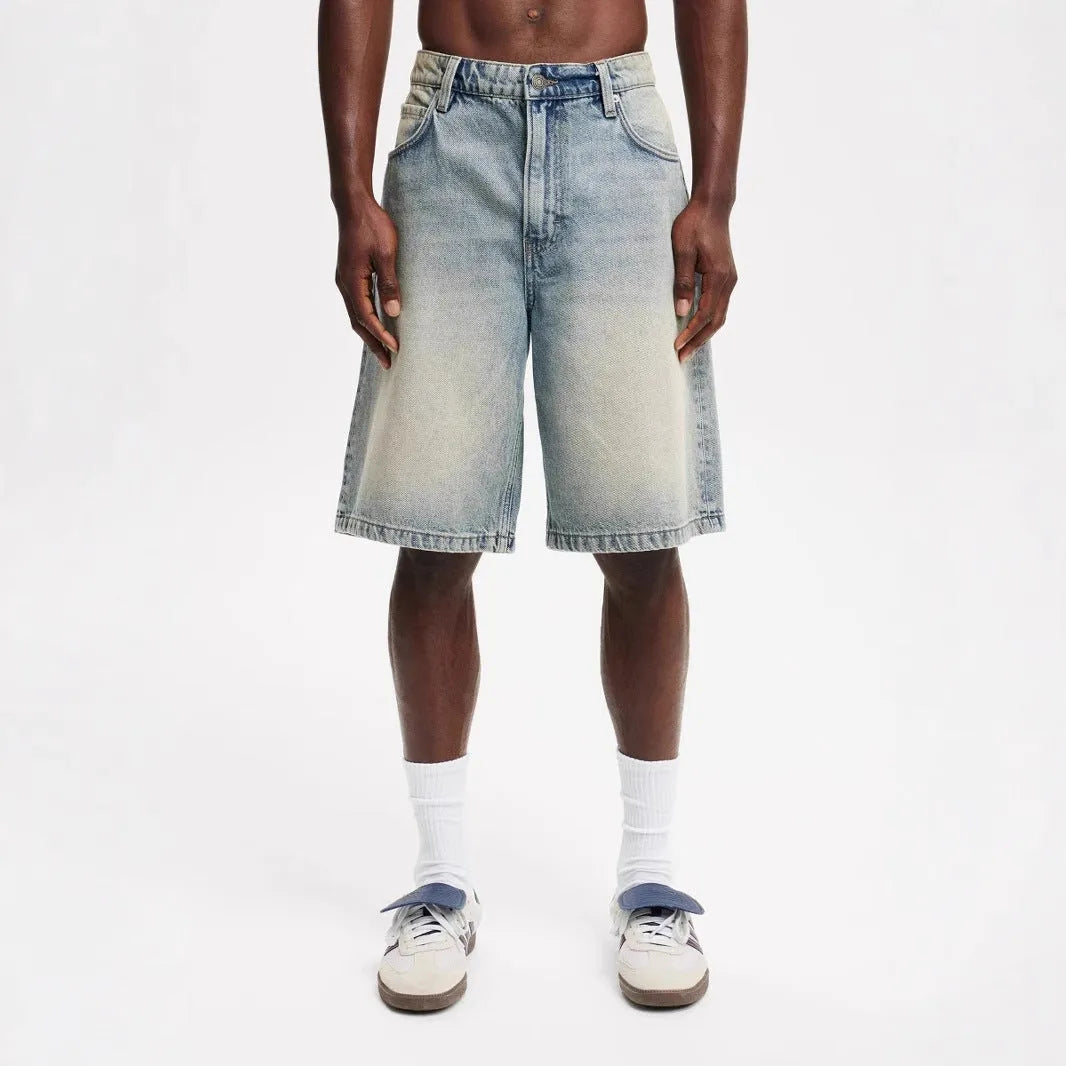 Men's loose straight cotton denim fifth pants in light blue, black, and gray for summer street style.