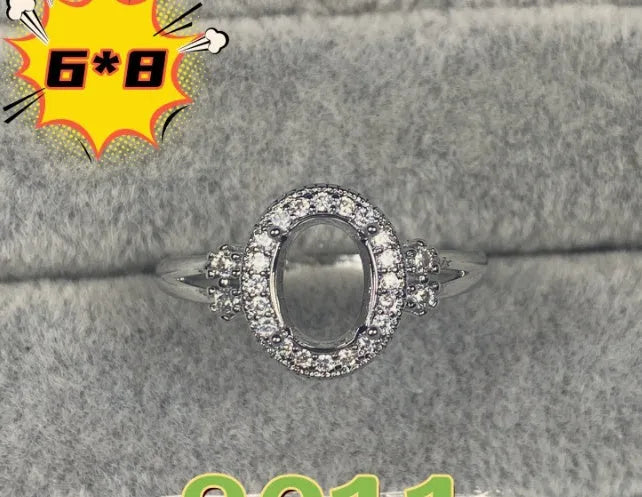 Oval denier ring with open mouth design and five-pointed star detail on electroplated copper