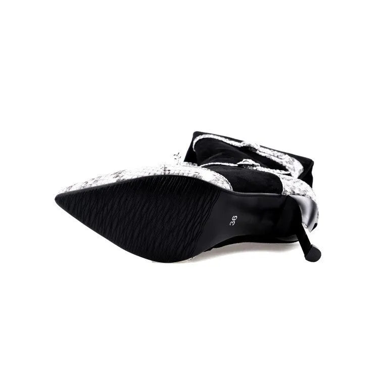 Grey and black women's knee high boots with a thin high heel on a rubber sole.