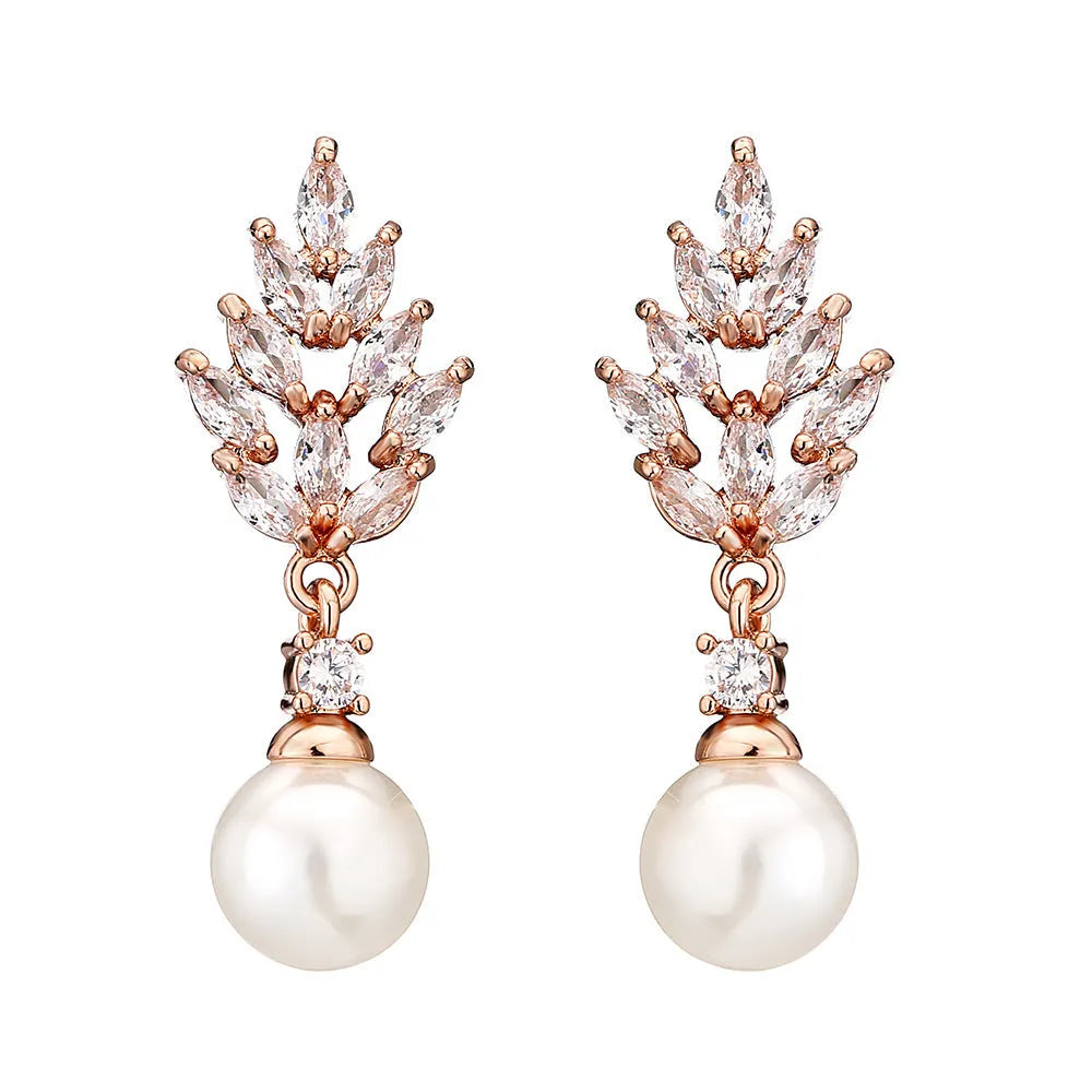 Geometric drop earrings with pearl and micro inlaid zircon, available in gold, platinum, and rose gold plating.