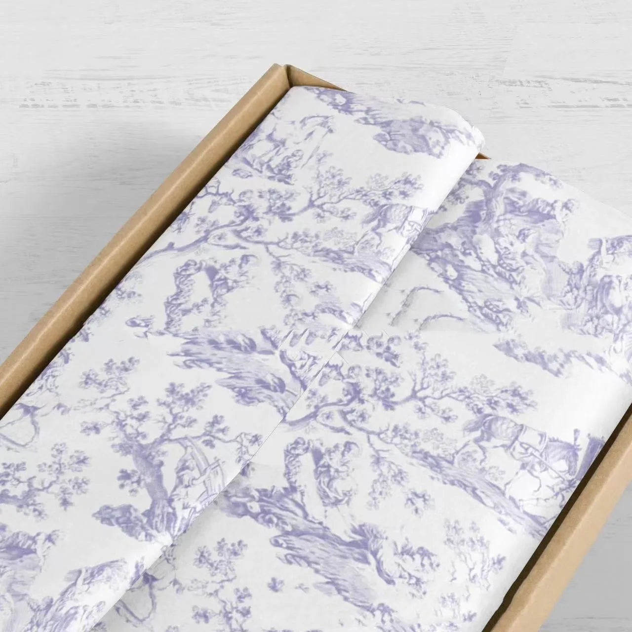 Pack of French MG tissue paper with retro floral print in pink purple and green purple colours, 50x70cm sheets.