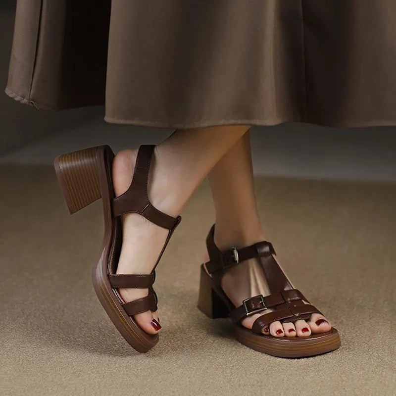 Women's black retro sandals with T-buckle strap, open toe, platform, and chunky heel