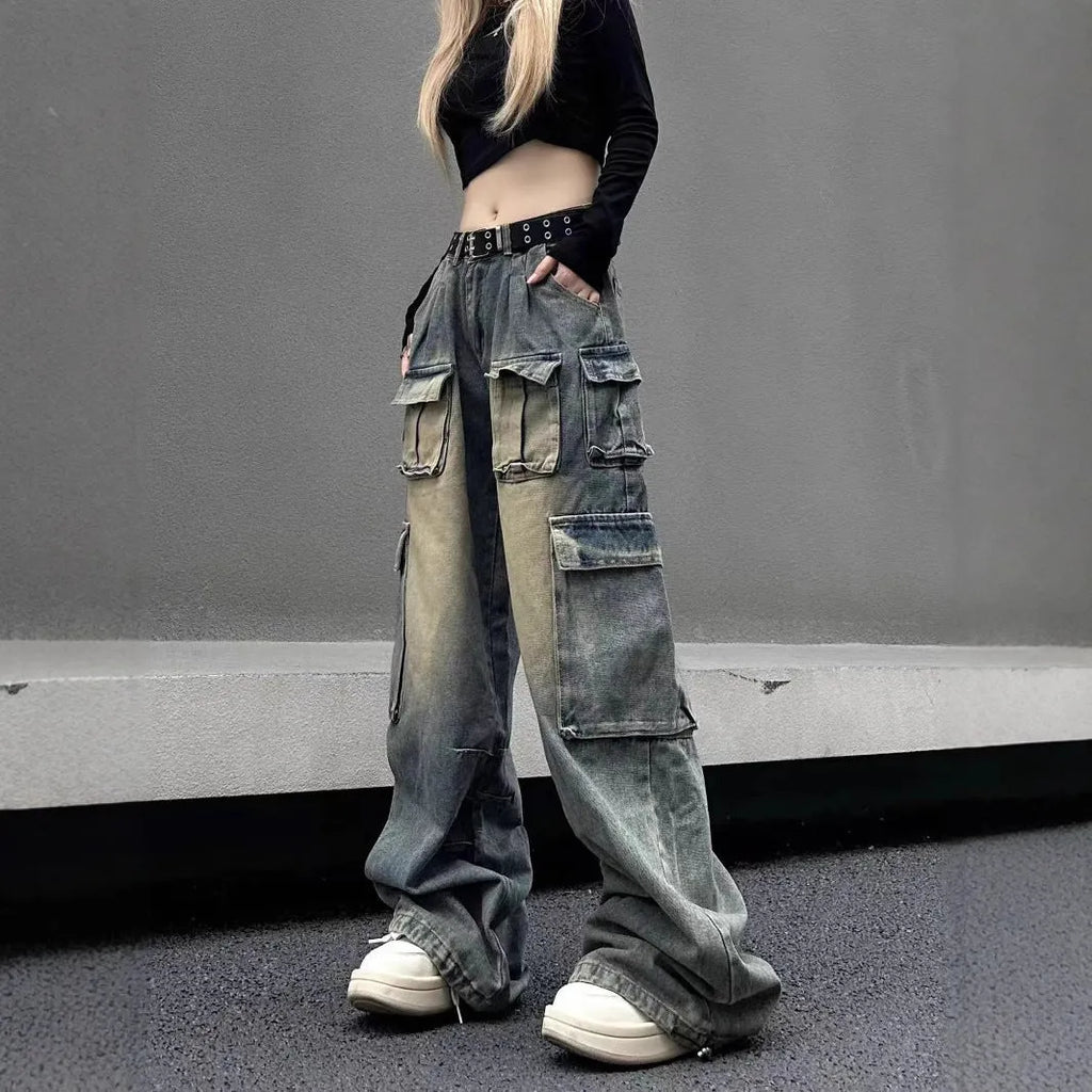 Loose fit multi-pocket distressed denim jeans in light blue colour with street hipster styling