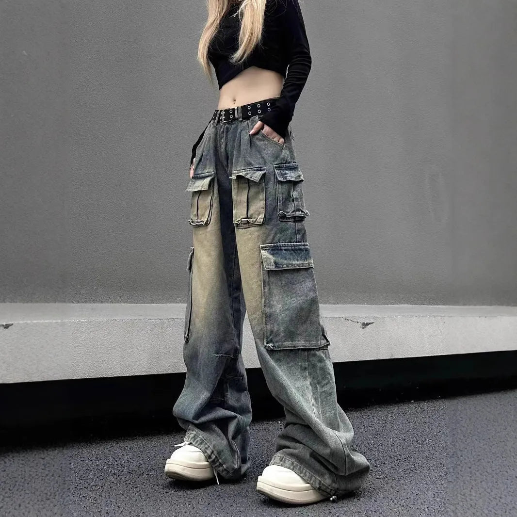 Loose fit multi-pocket distressed denim jeans in light blue colour with street hipster styling