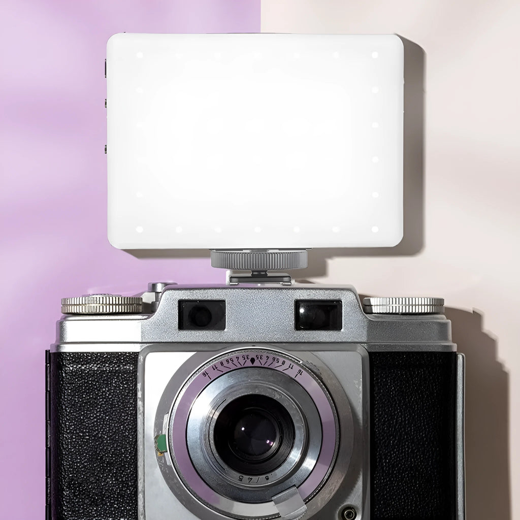 Pocket LED fill light with clip mount attached to mobile phone for photography lighting