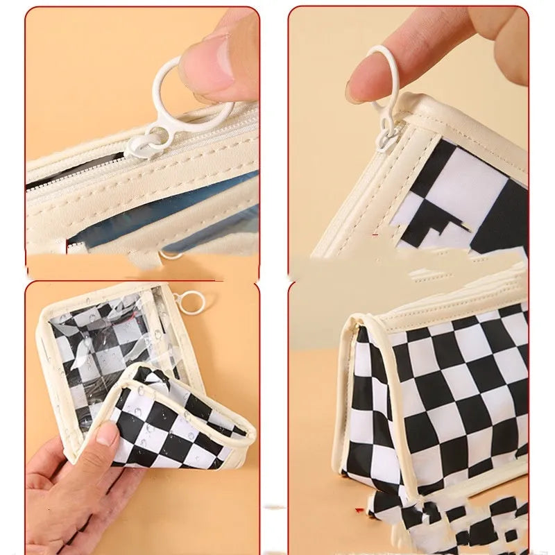 Transparent chessboard pattern PVC pencil case showing pens inside, black and white grid design