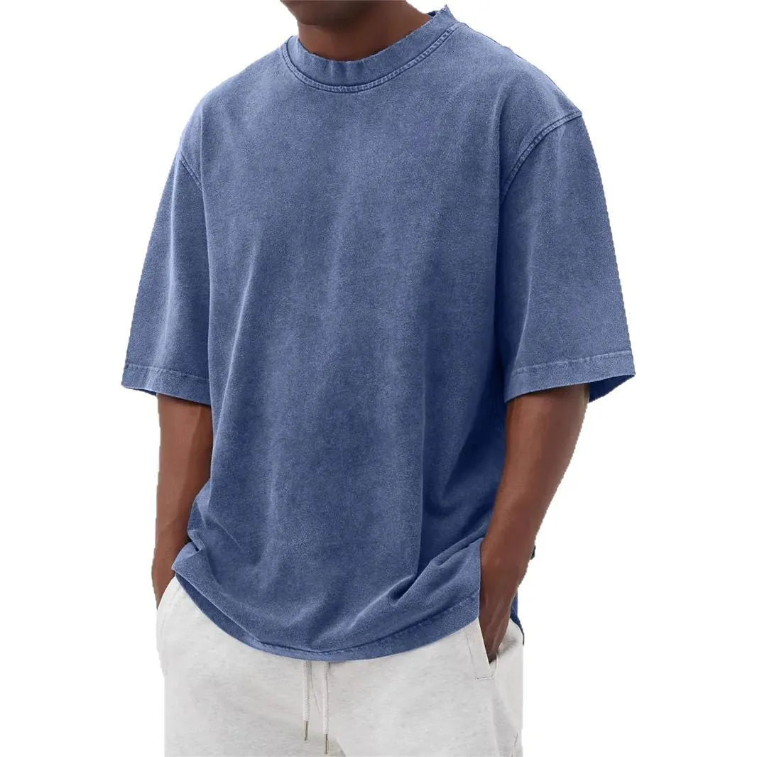 Men's stonewash distressed polyester pullover T-shirt in solid colour with loose fit and half sleeves