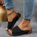Women's wedge beach slippers with flower cutout design in PVC material showing fish mouth toe shape