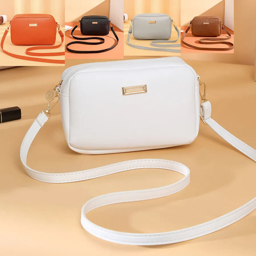 Solid colour women's PU shoulder bag with three-dimensional pockets in urban simplicity style