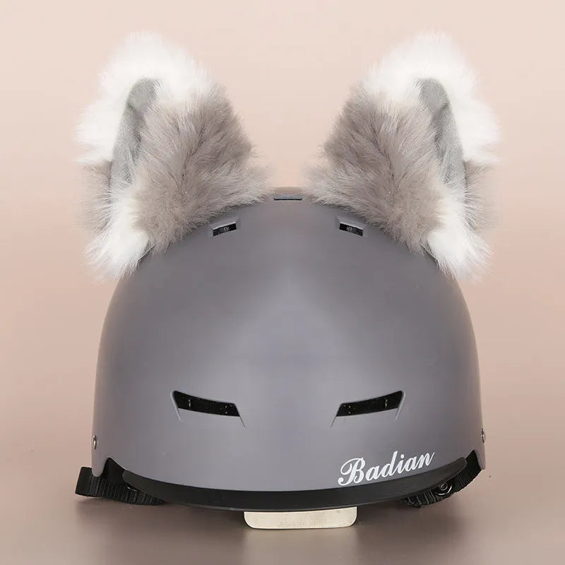 Cute cartoon plush decoration attached to a ski helmet
