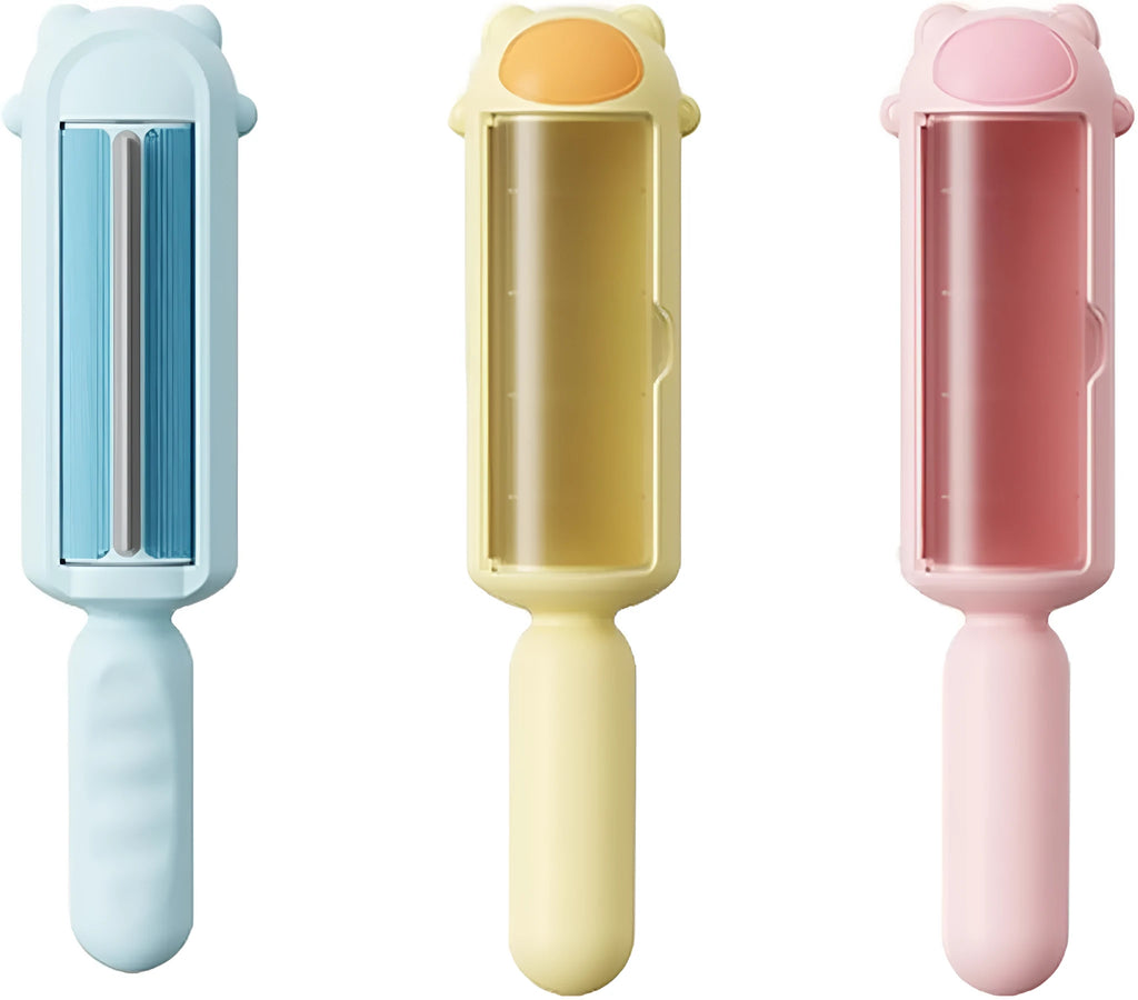 Blue pet hair remover roller with self-cleaning base on a carpet next to a dog.