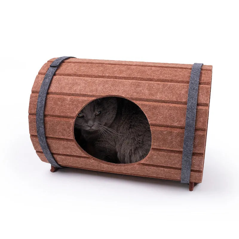 Assembled wine barrel-shaped cat bed made from soft grey polyester fibre felt.