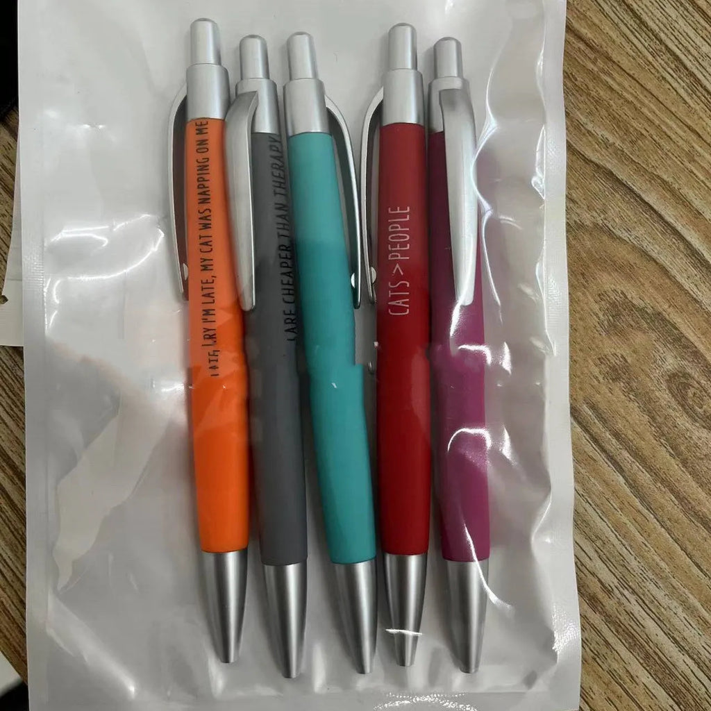 Set of five coloured push-action pens with cat or dog themes in beaded storage bag
