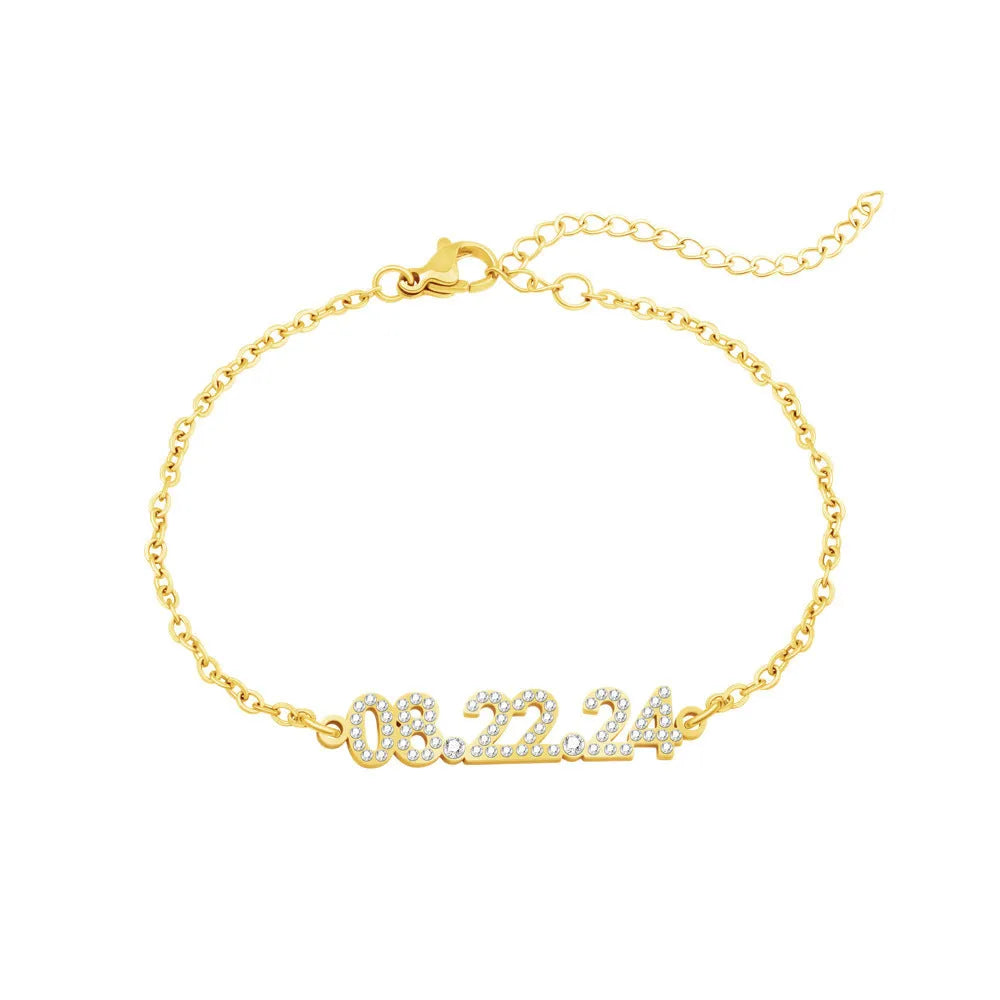 Stainless steel digital bracelet or necklace with diamond-set numbers in gold, rose gold, or steel colour.