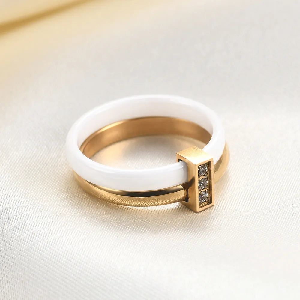 Women's ceramic ring with geometric design and zirconium detailing in steel black colour