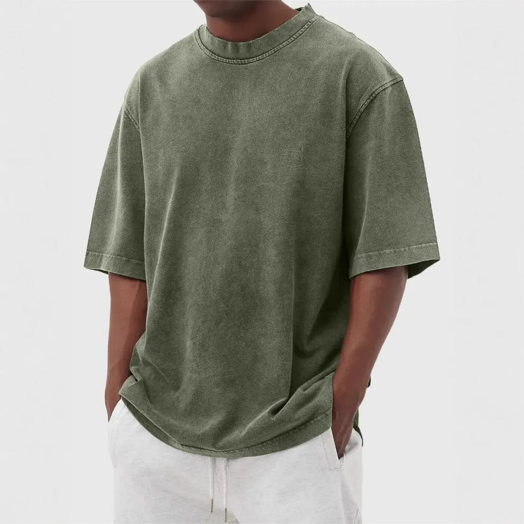 Men's stonewash distressed polyester pullover T-shirt in solid colour with loose fit and half sleeves